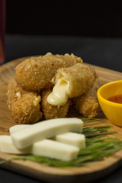 cheese crockets on wooden board